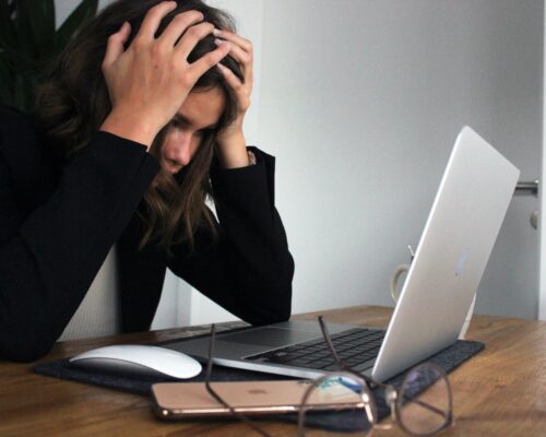 frustrated laptop user