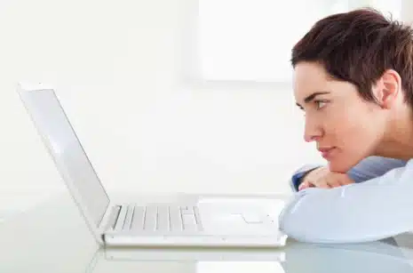 Business owner reviewing SEO metrics to determine if search optimization efforts are working.